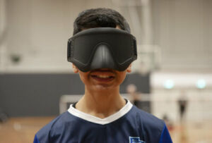 A Sydney Catholic Schools' goalball athlete wearing his blackout shades