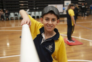 A Sydney Catholic Schools' goalball athlete smiles for the camera